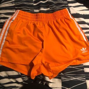 Orange Adidas shorts